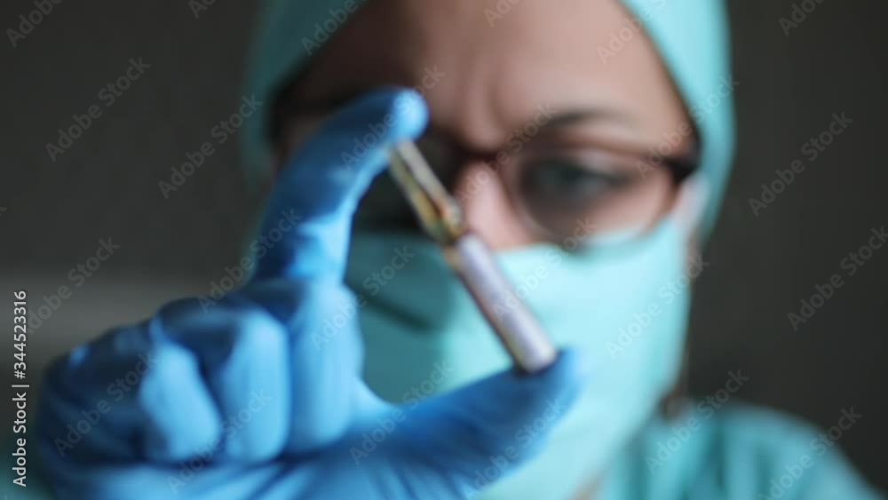 Conceptual focus transition video of a doctor holding a recipient with the coronavirus COVID-19 vaccine. Conceptual focus transition video of a doctor holding a recipient with the coronavirus COVID-19 vaccine.