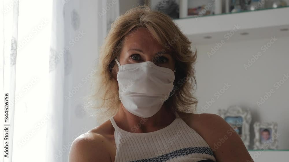 Portrait of Blond Woman Wearing Mask at Home Portrait of Blond Woman Wearing Mask at Home