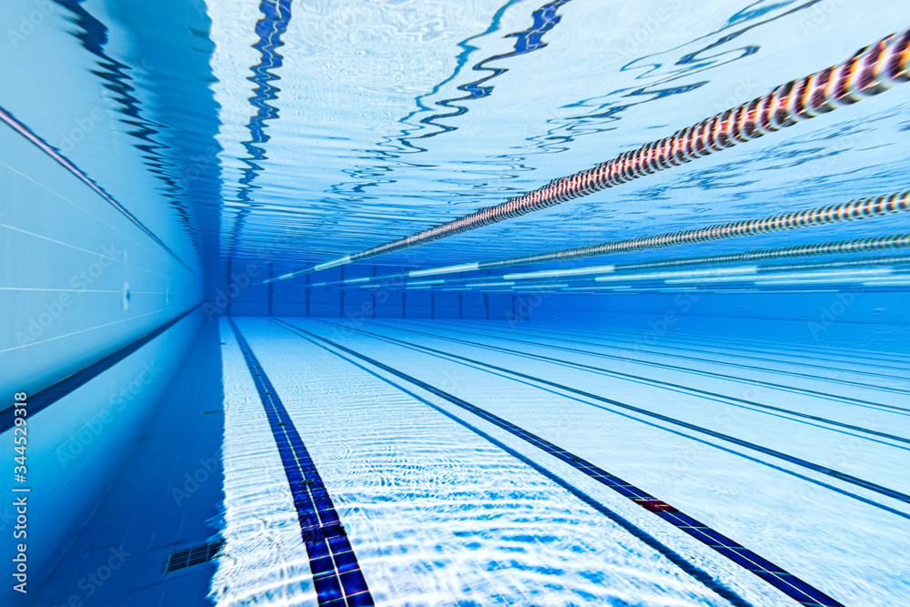 Fototapeta premium Olympic Swimming pool under water background.