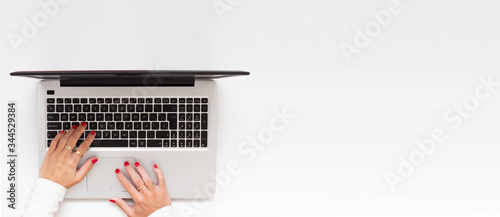 Business woman telecommuting. Professional girl in workspace, telecommuting. Flat lay with copy space