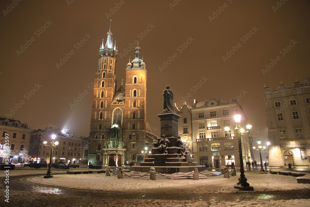Obraz premium Main Square of Cracow by night, winter time, Poland