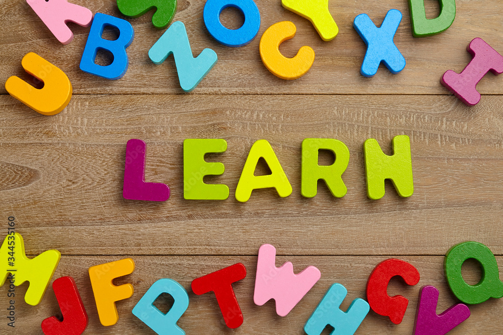 Fototapeta premium Alphabet wooden letters for early education concept