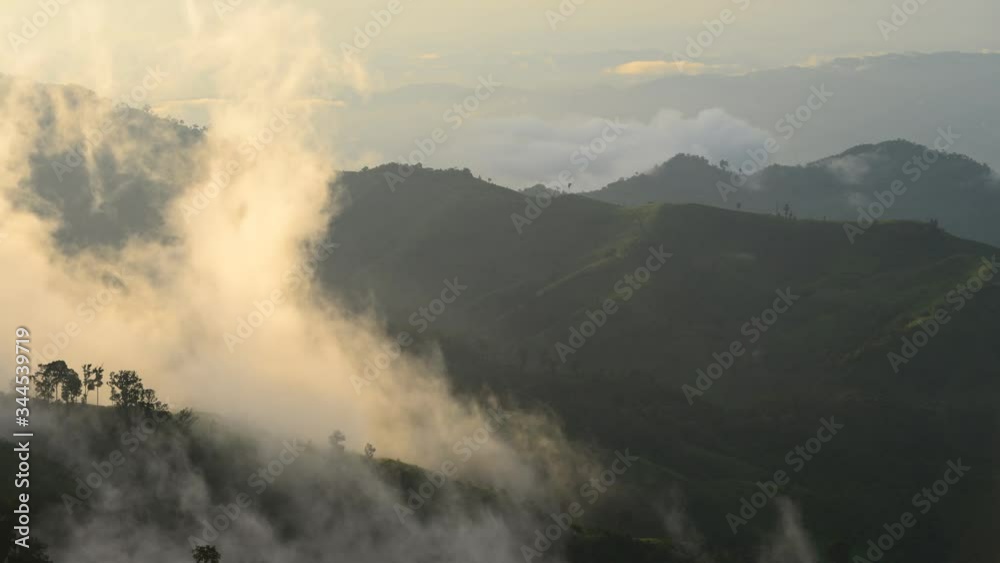 Fog lingering over the mountainous ranges in Thailand Fog lingering over the mountainous ranges in Thailand