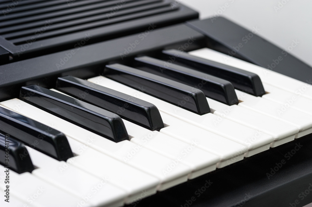 music keyboard isolated, side view music keyboard isolated, side view