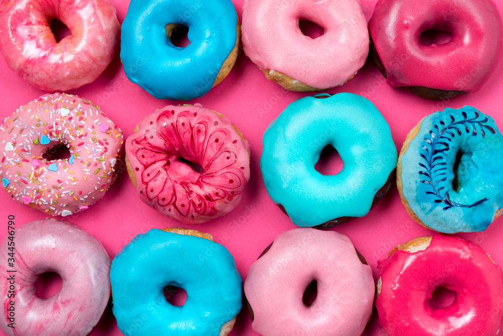 Sweet topping donut assortment flat lay Sweet topping donut assortment flat lay