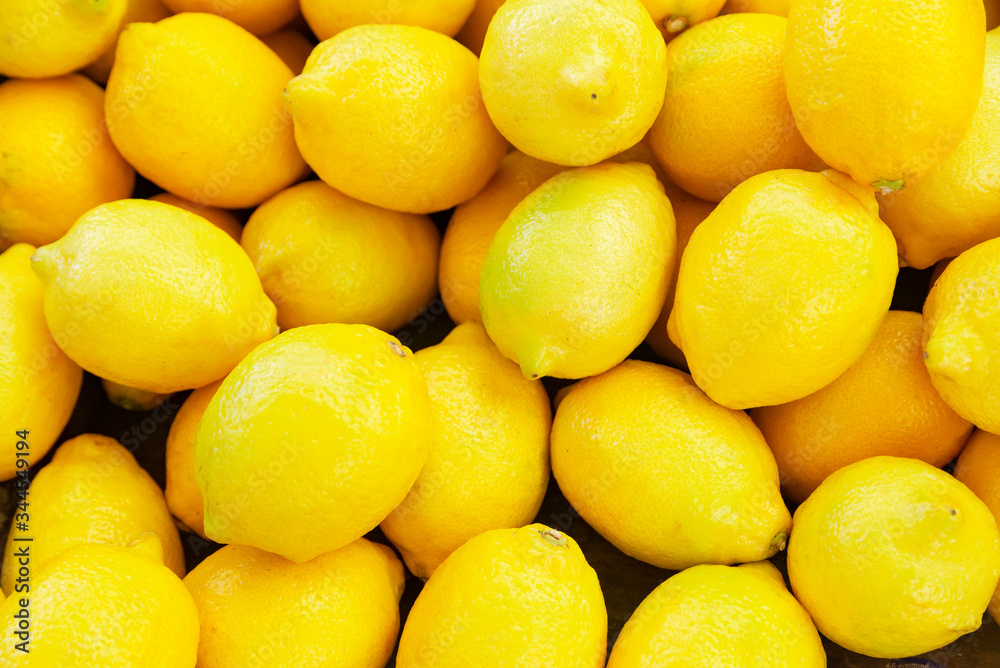 Colorful Display Of Lemons at fruit and vegetables street Market, organic ecological food from local producers