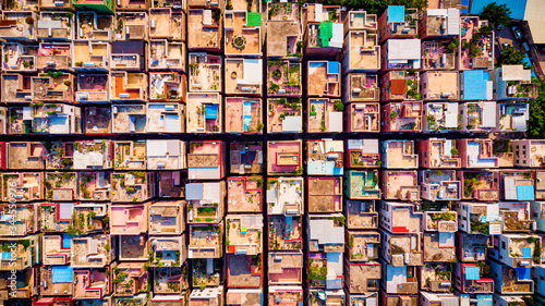 Canvas Print Aerial populated village buildings in a city