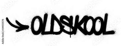 graffiti oldskool text sprayed in black over white photo