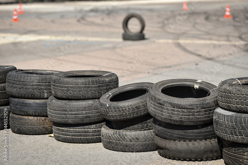 Safety barrier made of used tires inside a driving school polygon