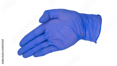 Hand wearing blue nitrile examination glove makes a cut gesture. Nonverbal hand signal for dermatological surgery