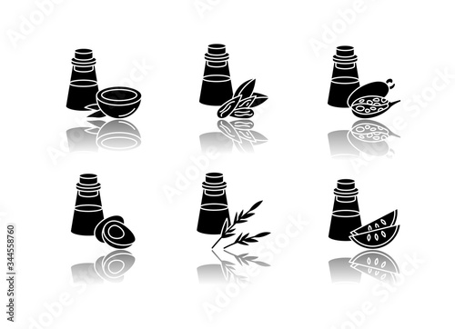 Hair oils drop shadow black glyph icons set. Jojoba ingredient for cosmetic product. Dermatology treatment with natural herbal essence. Isolated vector illustrations on white space
