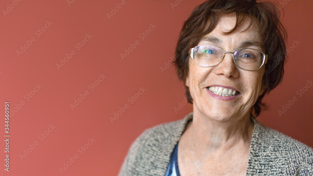 Happy smiling elder woman in eyeglasses. Happy smiling elder woman in eyeglasses.
