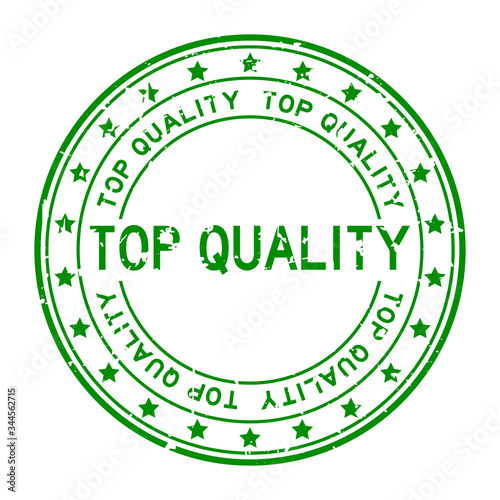 Grunge green top quality word round rubber seal stamp on white background