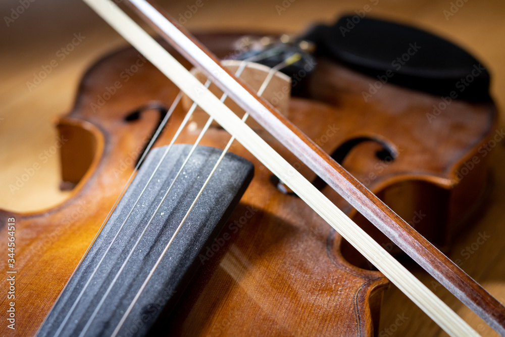 Violin body and bow with short focus Violin body and bow with short focus