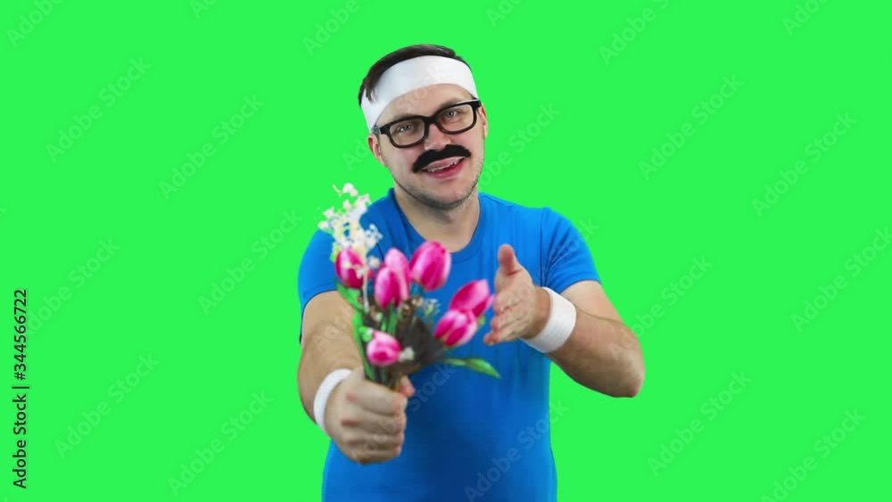 Athlete man gives a bouquet of flowers. Athlete man gives a bouquet of flowers.