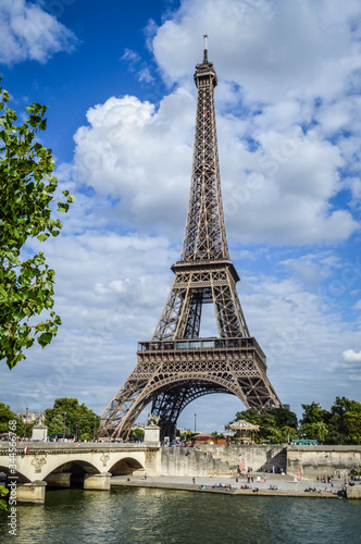 View of the Eiffel Tower with Seine River and bridge in summer, Paris, France. © sebastianosecondi