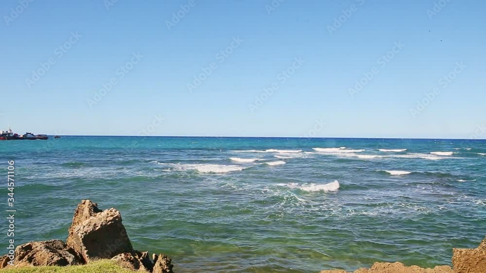 slowly panorama at white waves in endless ocean break up at rocky coast slowly panorama at white waves in endless ocean break up at rocky coast