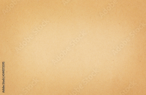 Brown or yellow paper texture background,Cardboard paper background,spotted blank copy space background in beige brown