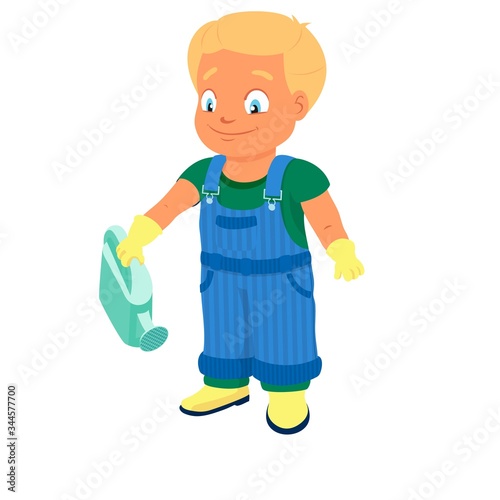 Smiling boy in a denim overall holds watering can