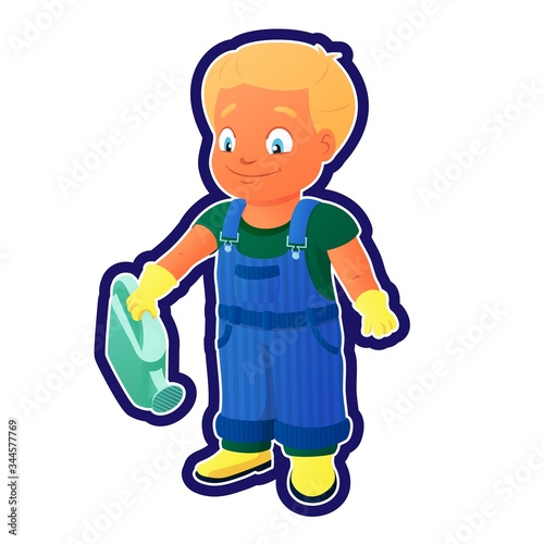 Smiling boy in a denim overall holds watering can