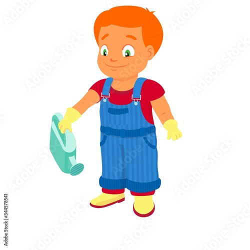 Smiling boy in a denim overall holds watering can