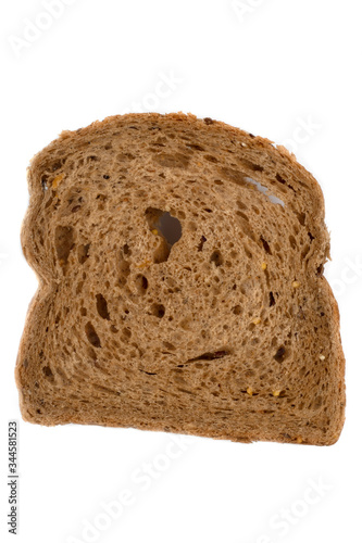 a piece of rye bread on a white background