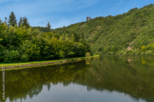 Saarschleife (river Saar loop) in Mettlach, Saarland, view from a sightseeing ship. Saar loop is one of natural wonders in Germany. photo