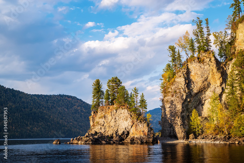 The rocky shore of a mountain lake. Russia, Altai Republic, Turochaksky district, Lake Teletskoye photo