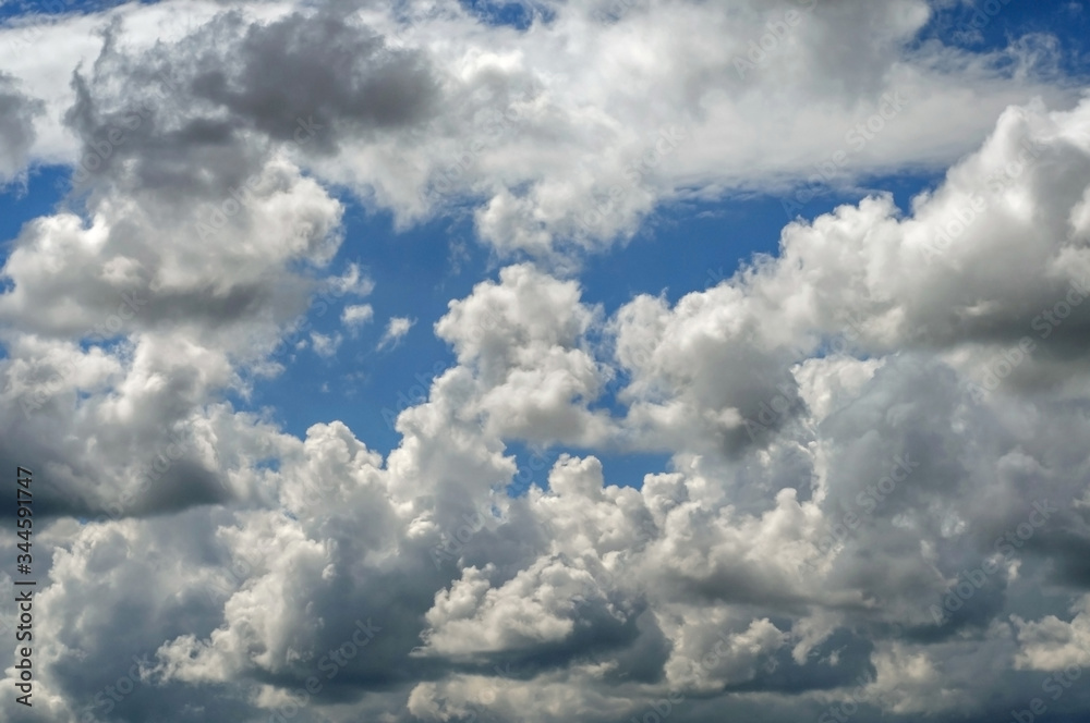 Obraz premium Clouds on the blue sky. Background with clouds.