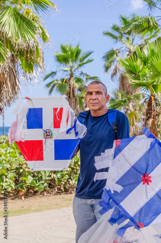 seller of Chichuguas or kite with the Dominican Republic flag in Santo Domingo photo