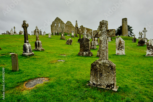 The cemetery in the medieval monastery of Clonmacnoise, Ireland, during a rainy summer day.