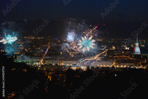 Panoramic view of Turin with fireworks at the feast of San Giovanni