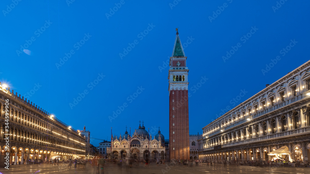 Bell tower and historical buildings at Piazza San Marco at night in Venice