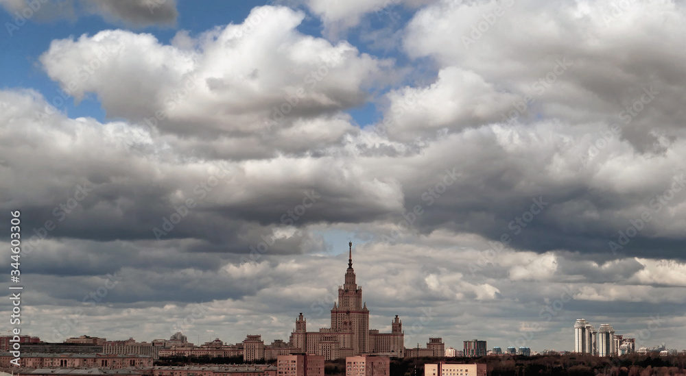 Obraz premium Dramatic clouds over spring campus of famous Russian university