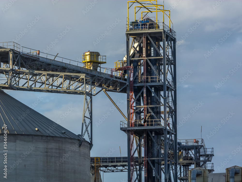 Silos and pier in golden hour