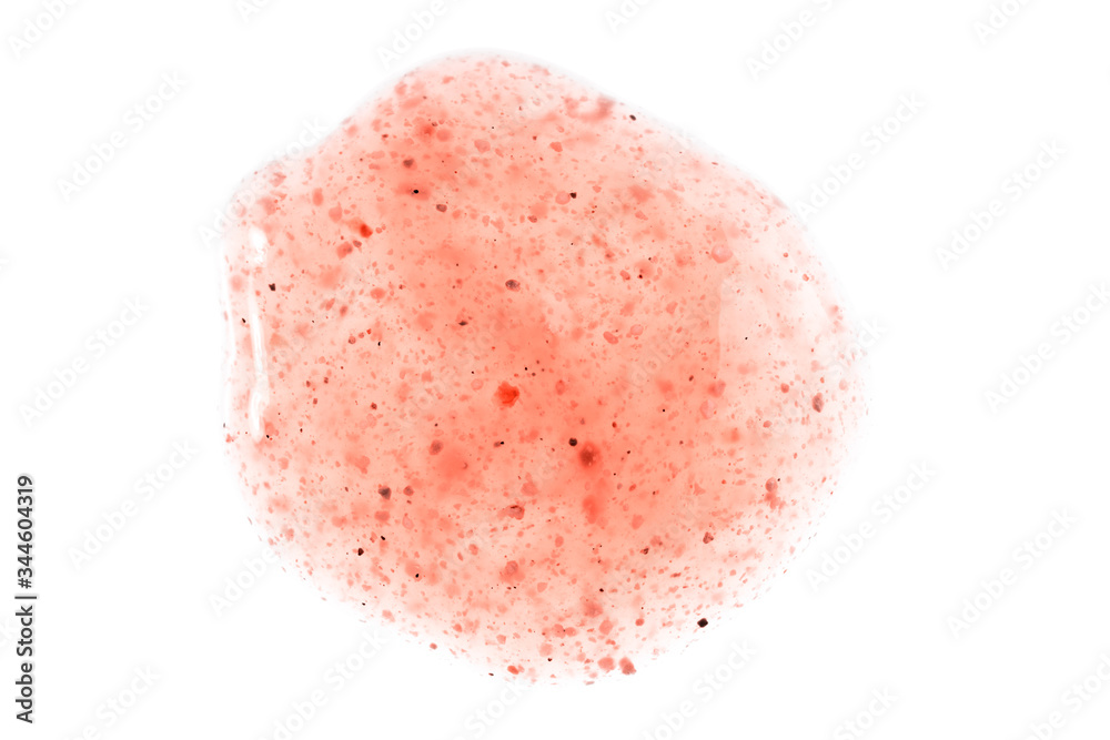 Fototapeta premium Body and face cosmetic pink swipe. Scrub sample swatch smear drop isolated on white. Peach peeling texture.