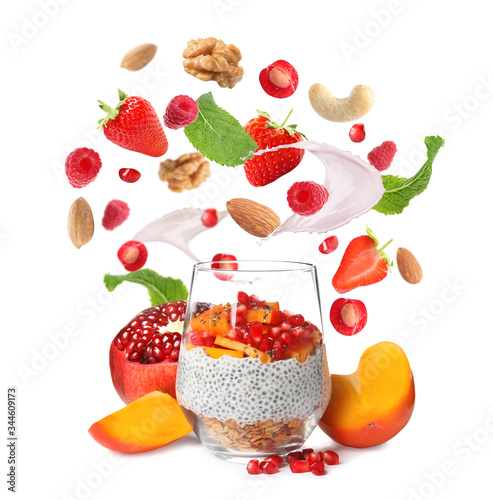 Fototapeta Naklejka Na Ścianę i Meble -  Chia pudding with yogurt and fruits on white background