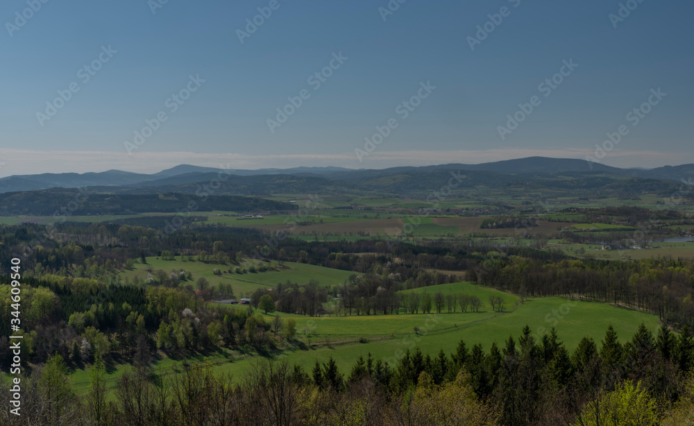 Fototapeta premium View from Svobodna hill in spring day with fields and meadows