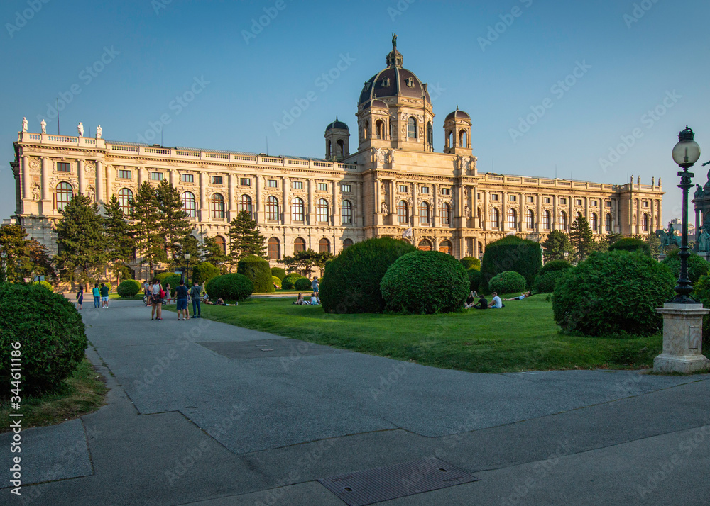 Tourists arrive to view the historic artwork of the Kunsthistorisches Museum in Vienna, Austria