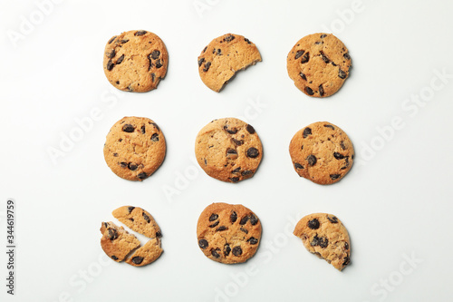 Flat lay with chocolate chip cookies on white background