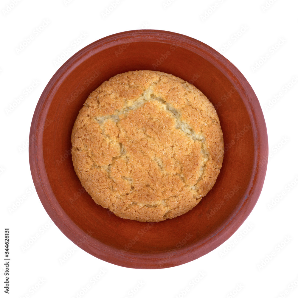 Fototapeta premium Single coconut flavor cookie on a small dish