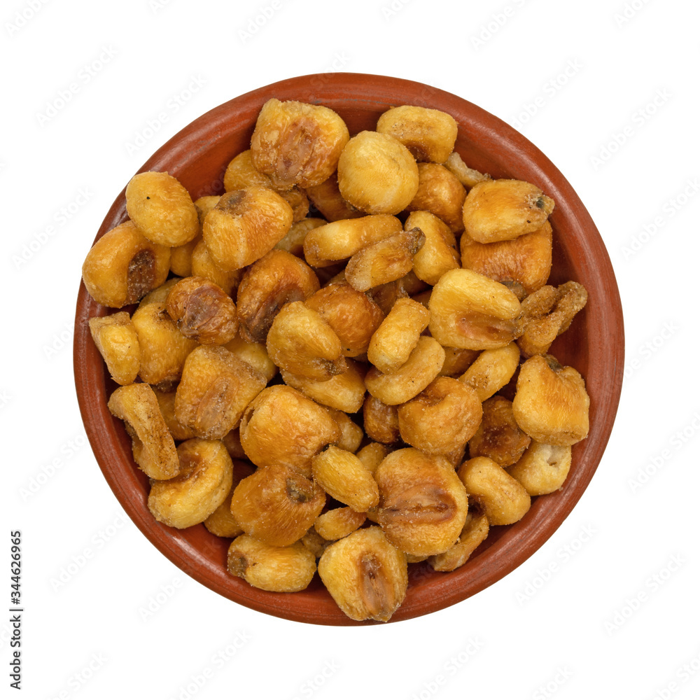 Top view of a small bowl of organic corn nuts Top view of a small bowl of organic corn nuts