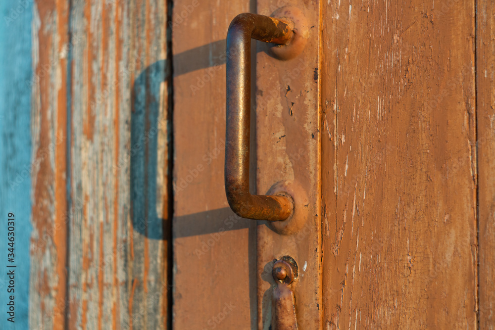 old door handle with lock on wooden door old door handle with lock on wooden door