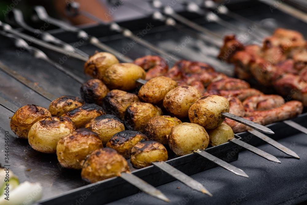 charcoal fried potatoes on skewers charcoal fried potatoes on skewers