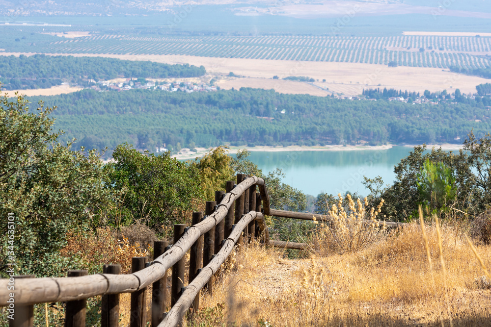 Summer view of the Cubillas reservoir from the Torreón de Albolote in Granada Summer view of the Cubillas reservoir from the Torreón de Albolote in Granada