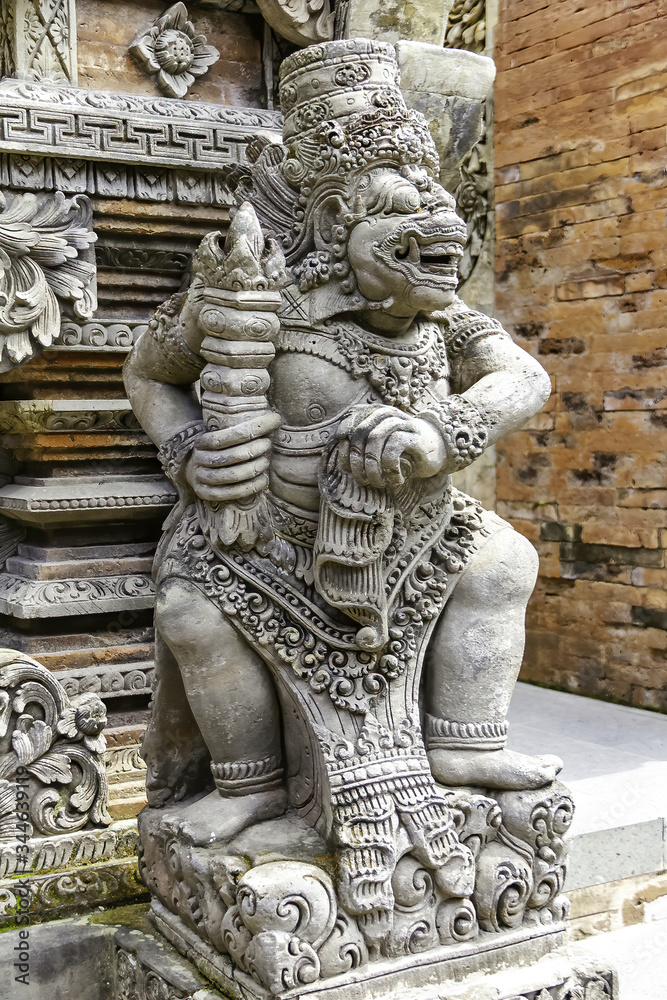 Stone figure of a protective guardian located at the entrance to Javanese temples. Sonobudoyo at Yogyakarta city, Island of Java 