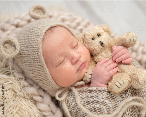 teddy bear baby. adorable newborn. cute newborn.