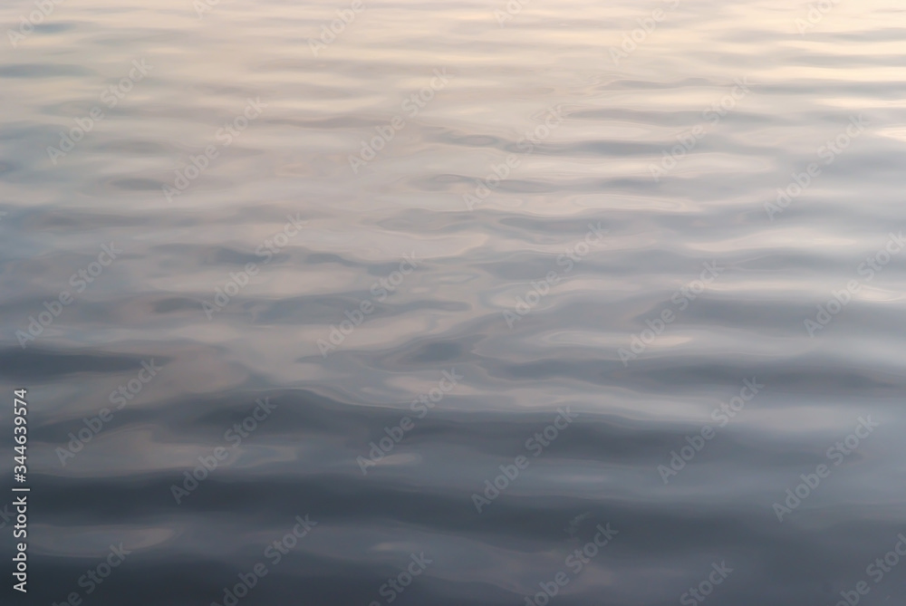 The surface of the lake at sunset. The surface of the lake at sunset.