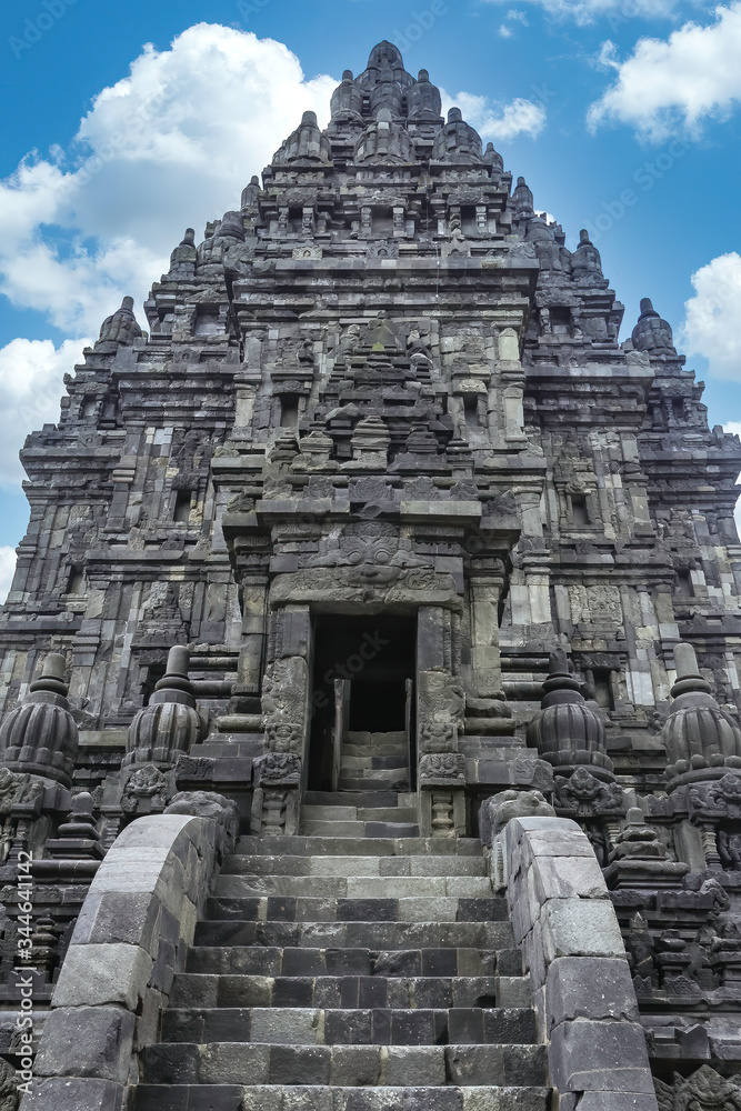 Upstairs to the biggest pagoda in Prambanan Hindu Temple near Yogyakarta, Java island, Indonesia