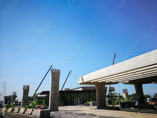 Road bridge with metal rod construction site, steel reinforcement concrete bars with wire rod for building.
